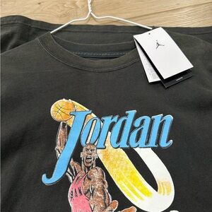 Women’s Jordan Black and Blue Graphic Tee small oversized